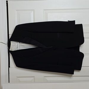 THE TUXEDO:A classic look tuxedo from Adolfo. Rich, lustrous wool.